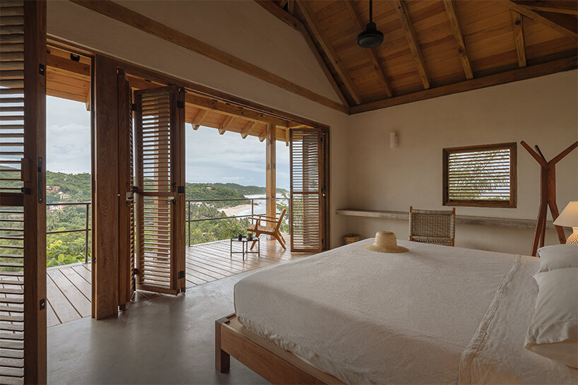 the bedrooms offer ocean and mountain views
