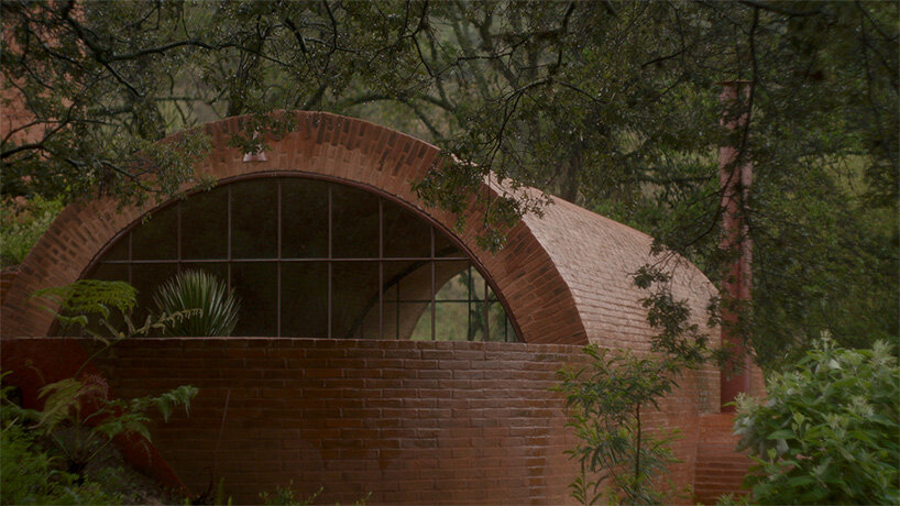 the main structure is supported by wide, low walls | image by Juan Benavides