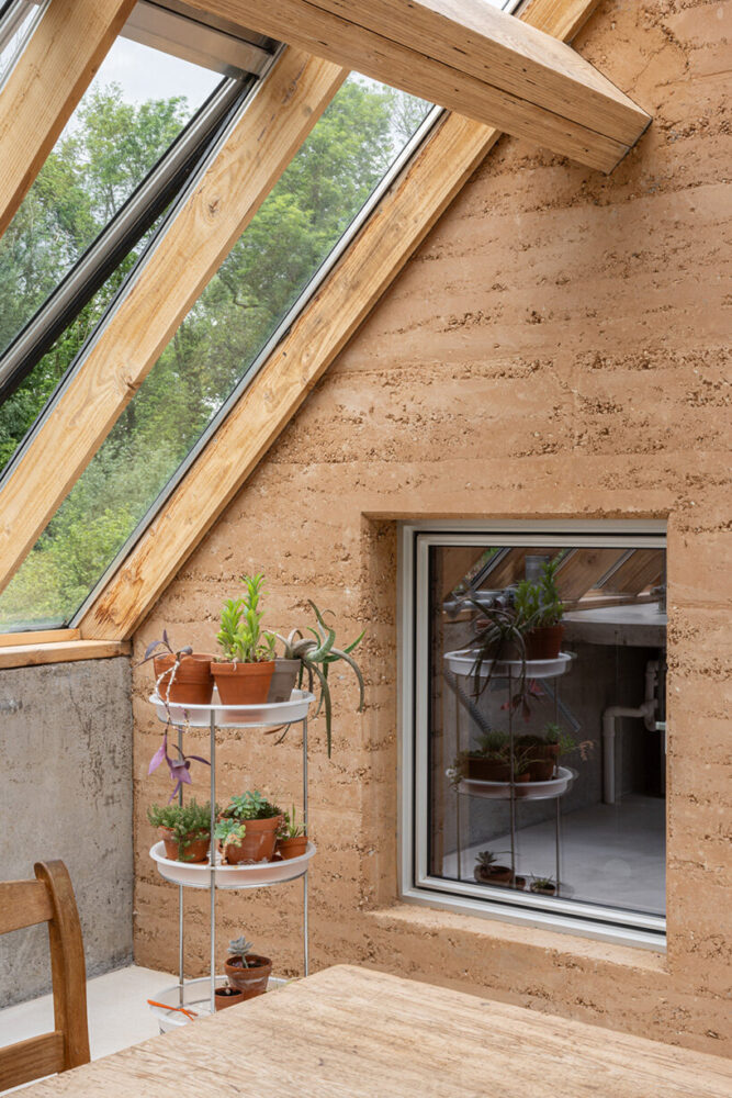 a new winter garden is bordered by the thermal earth wall