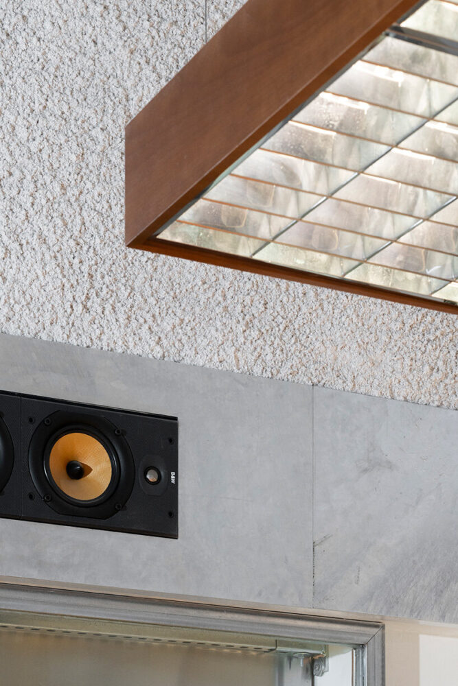 using reclaimed lighting optics salvaged from old office fixtures