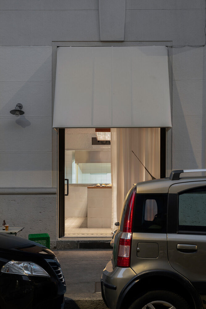 inviting passersby to feel welcome as if stepping into a neighbor’s home