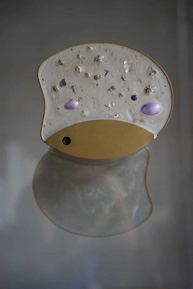 door handle resembles excavated ruins, fragments of ocean memory | image by Local Fish Coffee