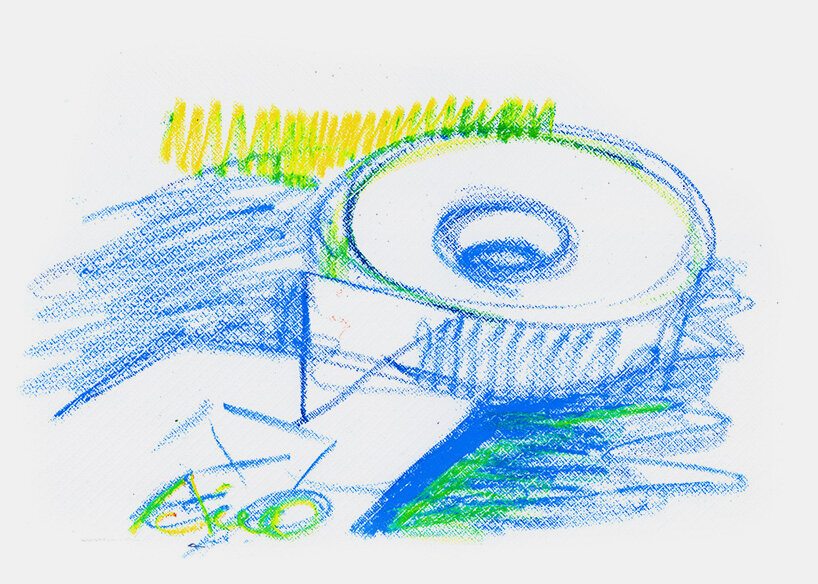 a circle, a square, and a triangle shape the building