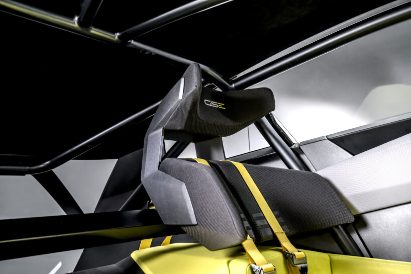 the single seat is suspended from the roof structure