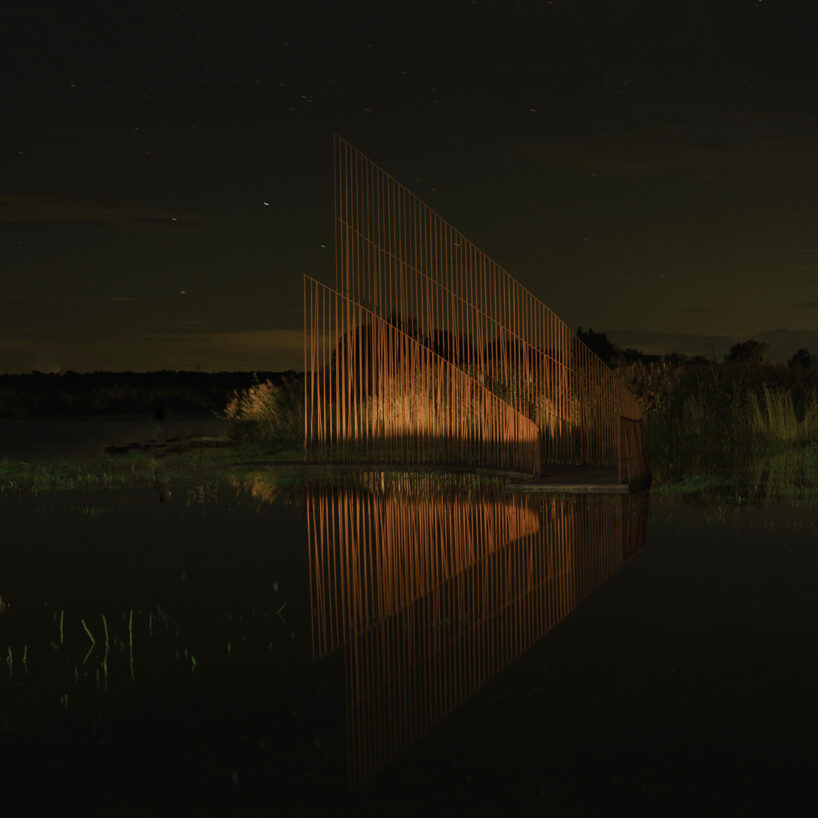 the pathway softly emerges at twilight, guiding visitors toward the water’s edge | image by Kristina Chan
