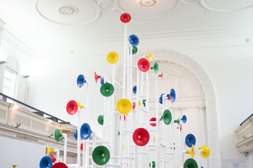 visitors use a set of pipes, horns, and easy-to-use tools to reconfigure the pavilion-looking structure