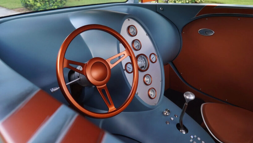 a hand-formed dashboard and a center console were built from metal and painted to match the body
