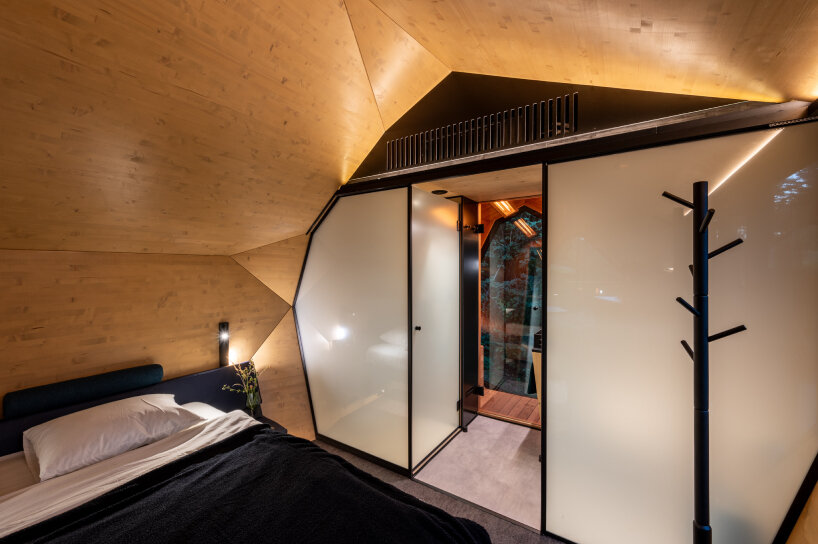 view of the bed and the bathroom