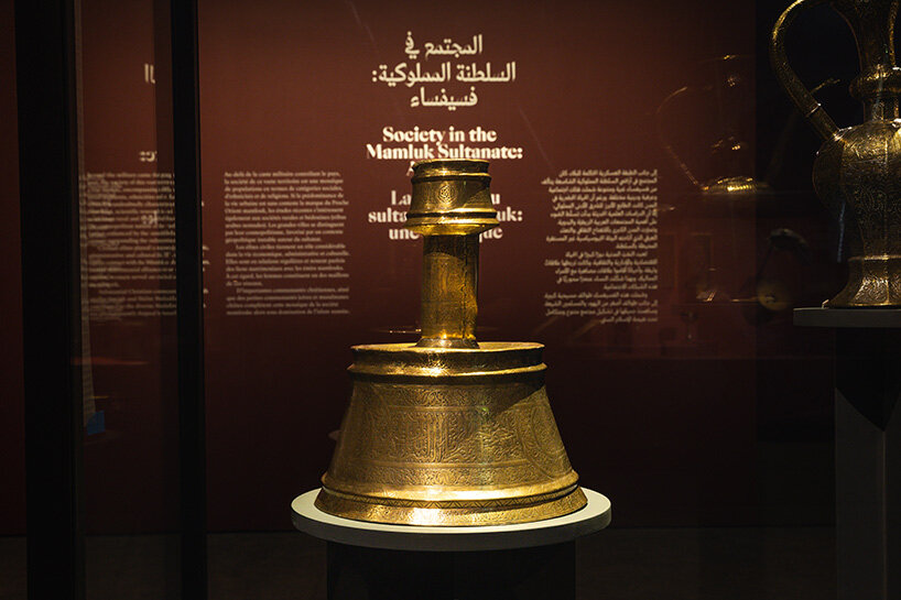 Candlestick for the consort of Sultan Qaytbay (r. 1468–1496) Egypt, Cairo C. 1468–1496 Chased copper alloy, inlaid with black paste Doha, Museum of Islamic Art, MW.17.1997