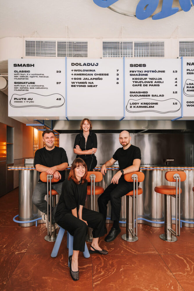 architects Bogna Kawa and Wojciech Nowak, and the owners of Pluto