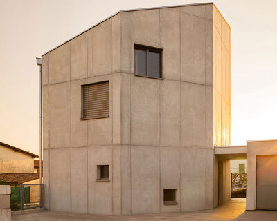 cuts and voids carve swisshouse xl's solid octagonal block by davide macullo architects