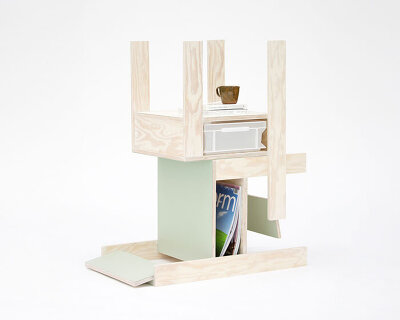 a pair of twin wooden chairs by A204 reconfigure into tables with drawers and shelving units