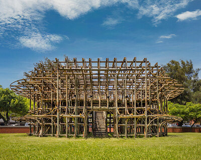 woven bamboo poles form cheng tsung feng's large-scale theatre installation in taiwan