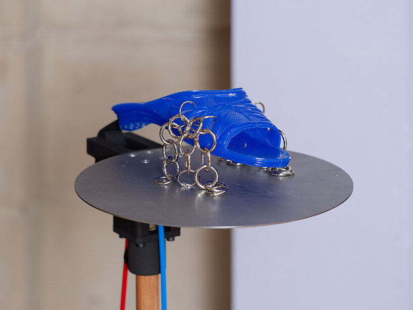 connecting the object’s humorous familiarity with its latent potential for dissent