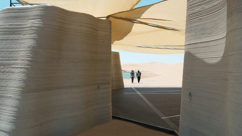 view through deck towards dunes | image by ©Huaer Lin