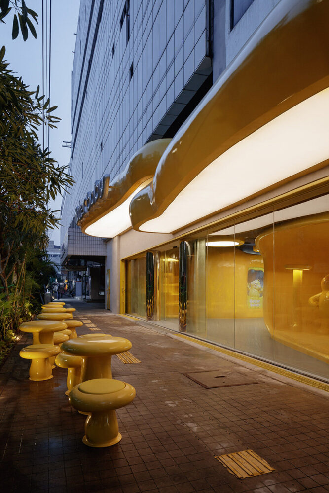 rounded street furniture extend the sculptural language outside