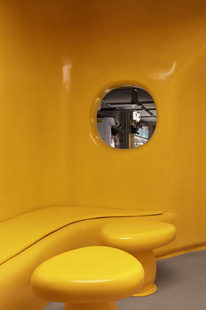 mushroom-like stools and amorphous tables continue the shop’s biomorphic language 