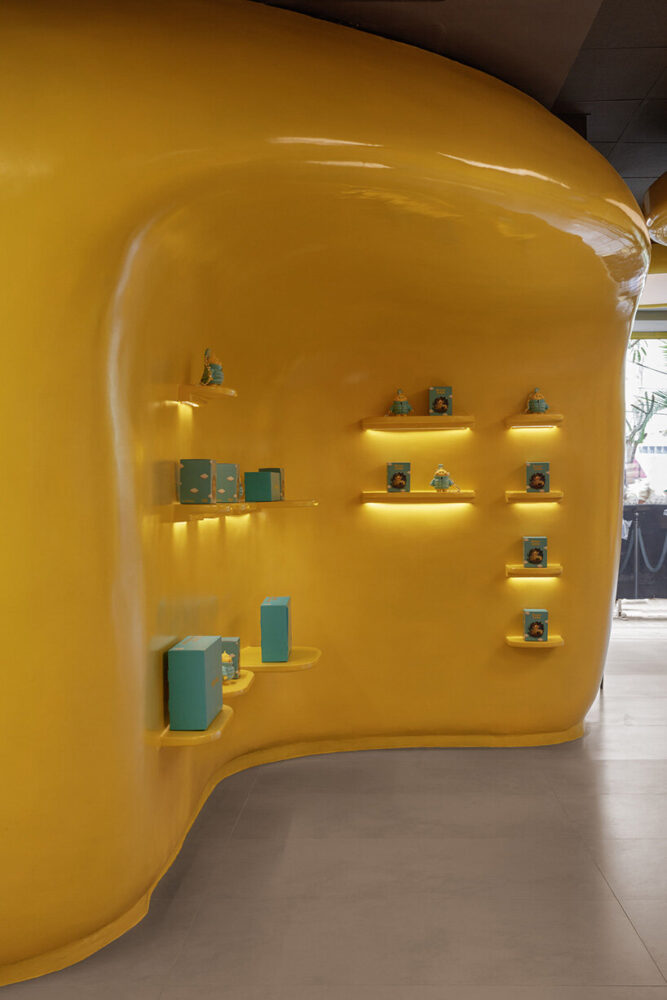 built-in alcoves contain collectible figurines of the Butter Baby character