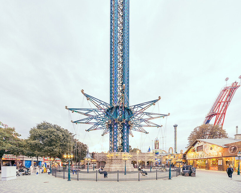 framing the gleaming, the garish, the worn, and the intimate moments of workers maintaining the rides