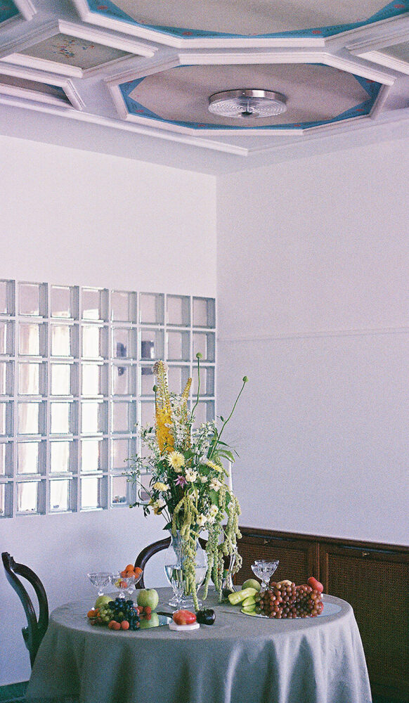 dining room features glass block wall | image by Costas Papapanagiotou