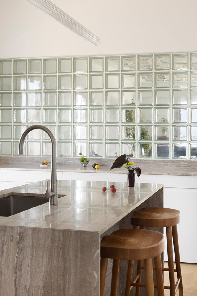 didyma marble sink and minimalist lighting