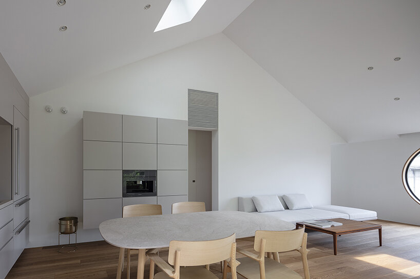 light enters through a skylight in the pitched roof