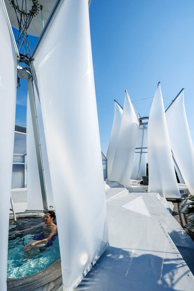 replacing the wooden interiors associated with saunas using a translucent, adaptable envelope