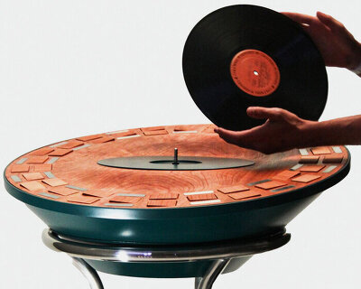 'orbit' kinetic turntable translates sound into motion through flipping wooden tiles