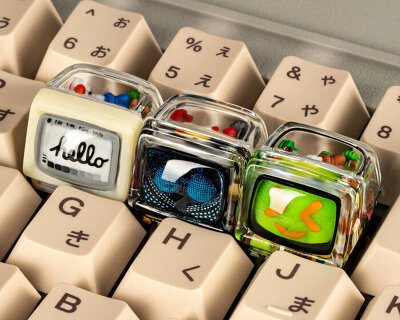 transparent keycaps shaped like retro TV take design cues from 1984 apple macintosh 128k