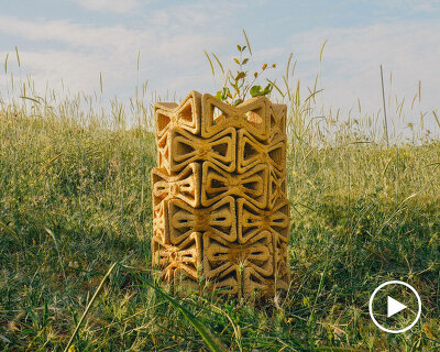 3D printed interlocking bricks compose earthen microclimate shelter for tree saplings