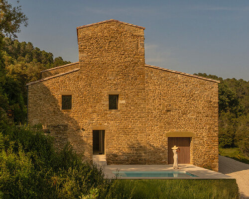 fran silvestre restores limestone farmhouse in spain as off-grid home and workspace