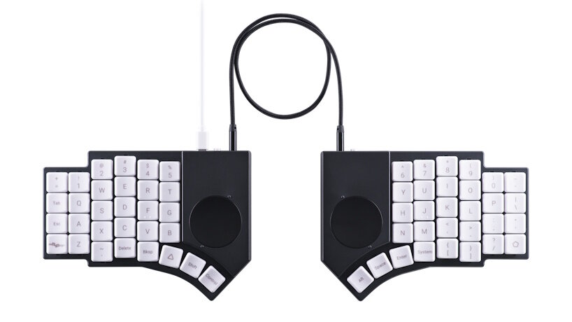 plug in the TRRS cable between the halves and a USB cable to the computer, and Go60 automatically turns into a fully wired setup