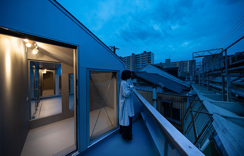 residents step directly onto the arcade roof to assist with maintenance