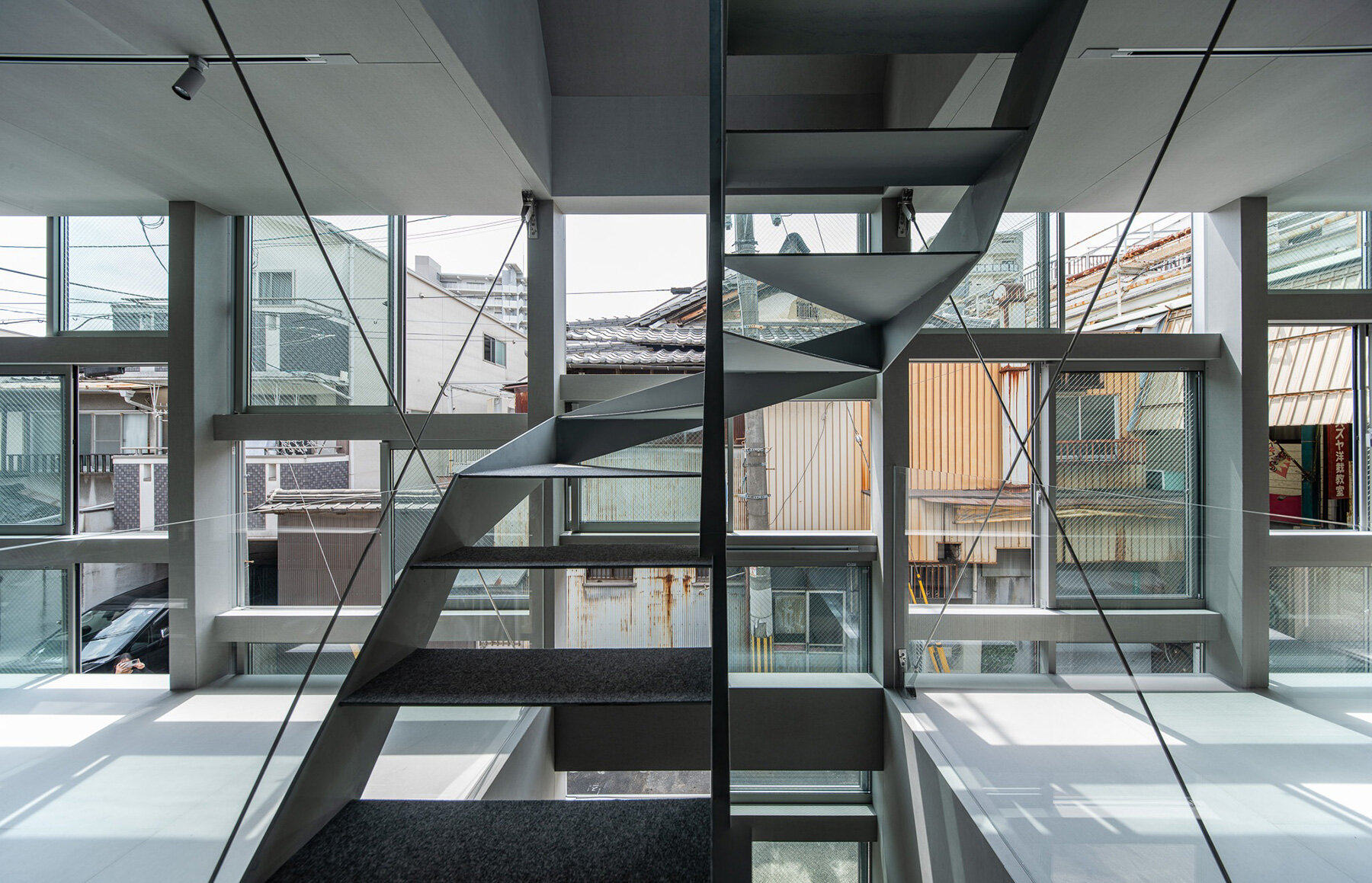 grid-facade-operable-windows-slender-residence-okuwada-architects-osaka-designboom-large01