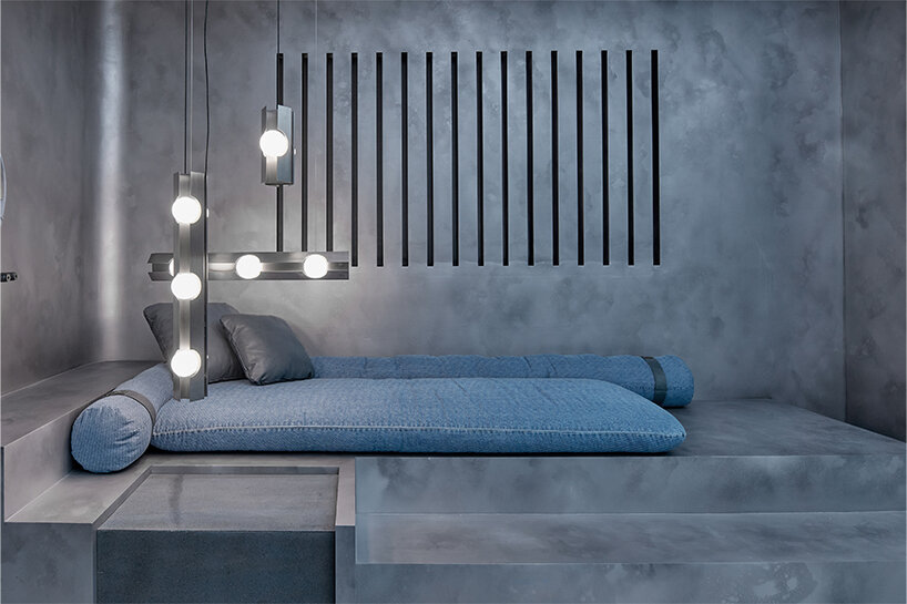 a nook in the space acts as a sitting area highlighting the lamps of Bandido Studio