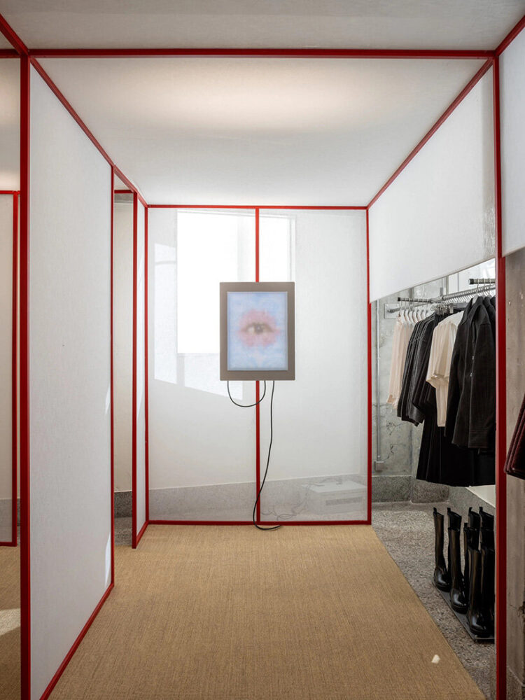 modular wooden container displays carve the space into a series of closets
