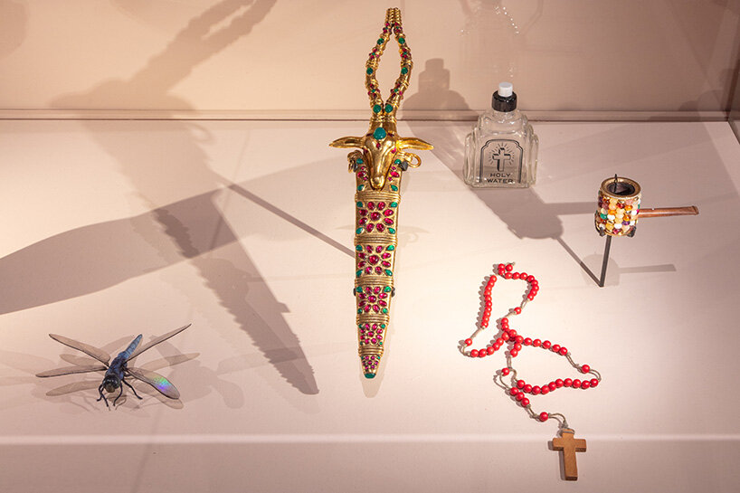 a Dunhill pipe and a jeweled dagger crafted by artist Harumi Klossowska de Rola