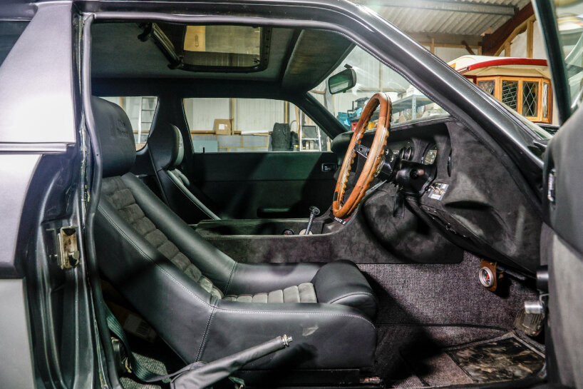 the cabin features leather and walnut wood veneer