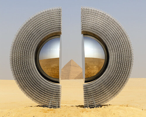reflective aluminum sculpture by mert ege köse splits apart to frame the giza pyramids