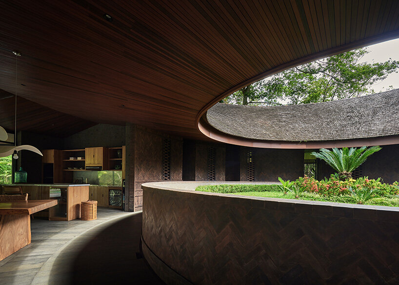 the circular plan reveals itself in the open living and kitchen area