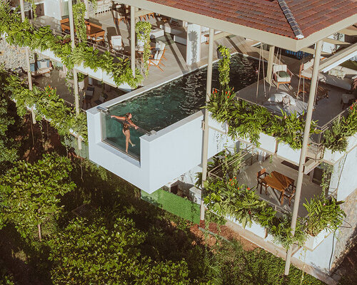 cantilevered swimming pool extends out from studio saxe’s ‘villa nuri’ in costa rica