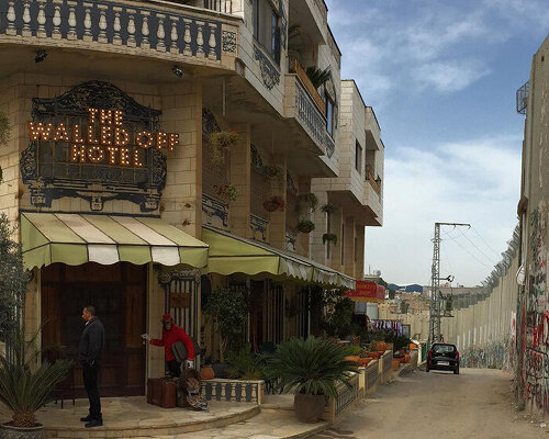 banksy’s ‘walled off hotel’ reopens in bethlehem after two-year closure
