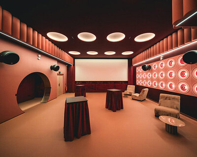 historic parisian cinema is reborn in wes anderson-like pastel hues and velvet touches