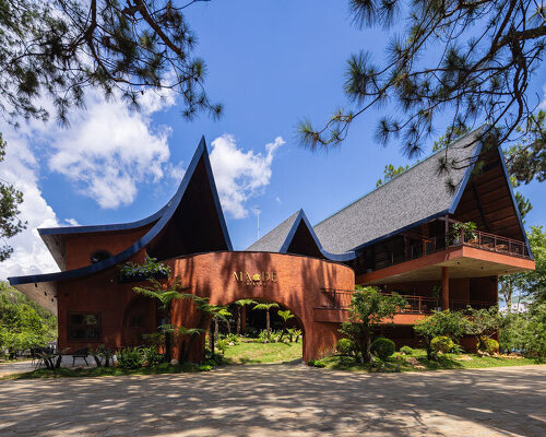 interlinked peaks shape bistro’s rhythmic canopy echoing mountain ridge in vietnam