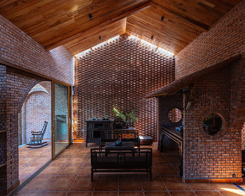textural brickwork shapes trung tran studio’s breezy ‘nang house’ in rural vietnam