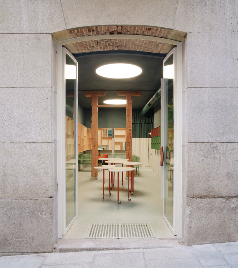 organic marble tables and vibrant hues complete madrid store by lucas y hernández-gil