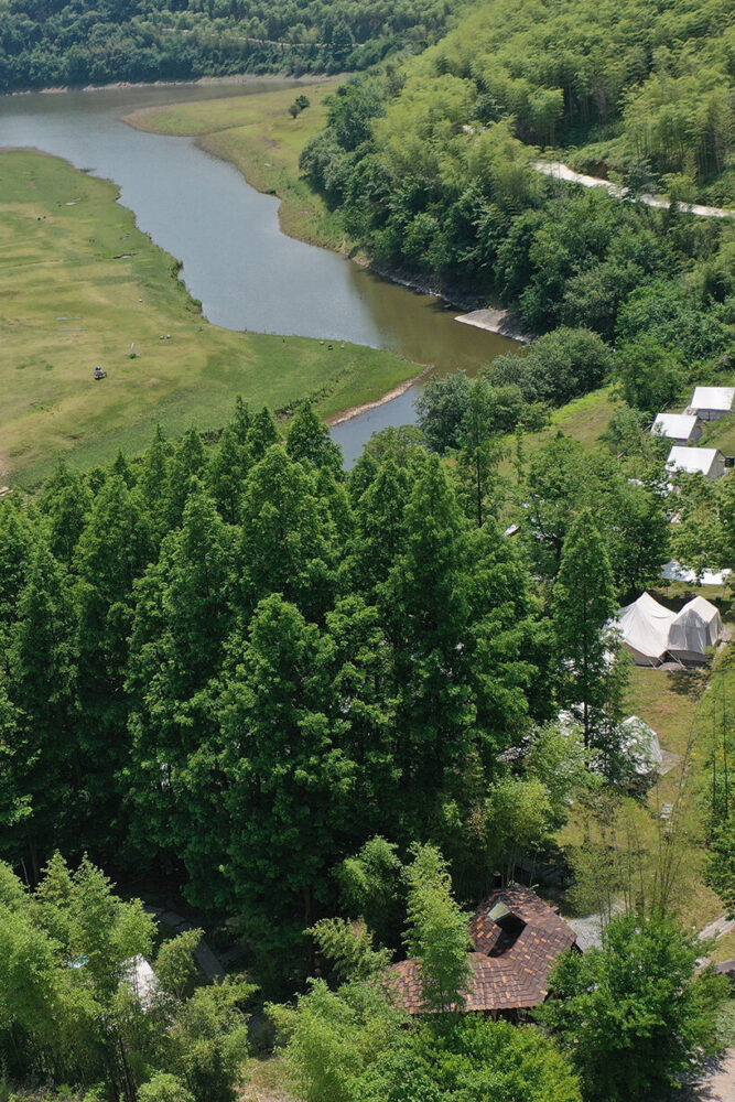 tucked into a forested campground in Anji, Zhejiang