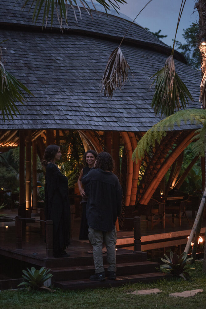 the stepped circular roof and arched bamboo supports shape the restaurant’s presence