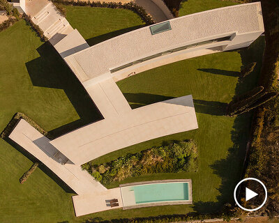 curved bodies organize sequence of gardens in spanish home by fran silvestre arquitectos