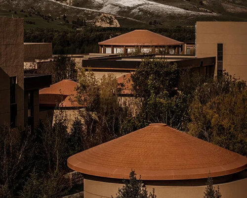 hotel by ccd reinterprets nomadic cultural patterns through dispersed brick volumes in china